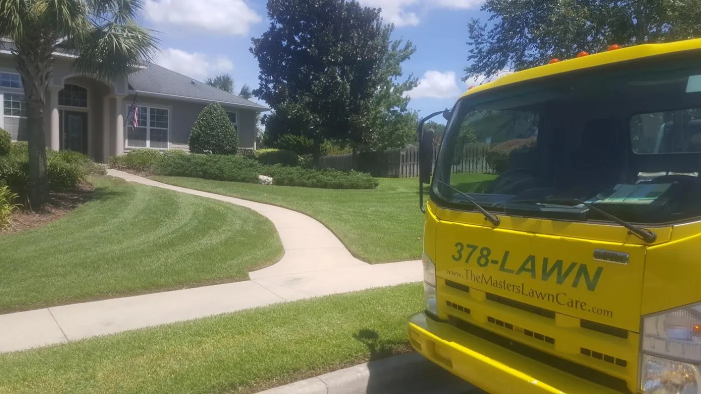 land health truck in front of residential lawn
