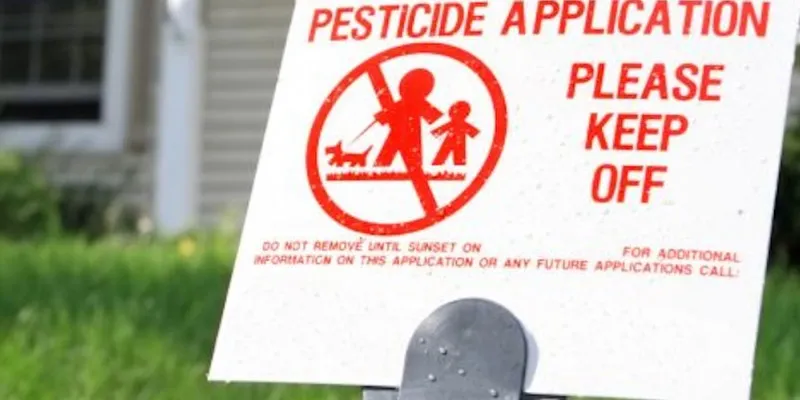 pesticide application yard sign